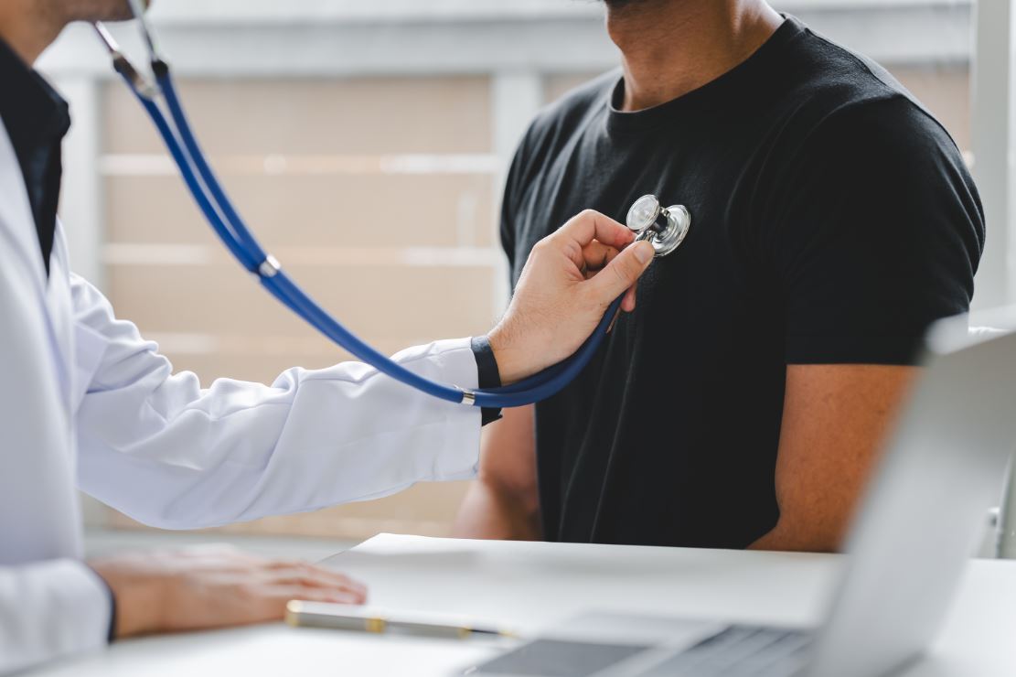 male-patient-consulting-medical-specialist-at-hosp-2023-11-27-05-05-47-utc